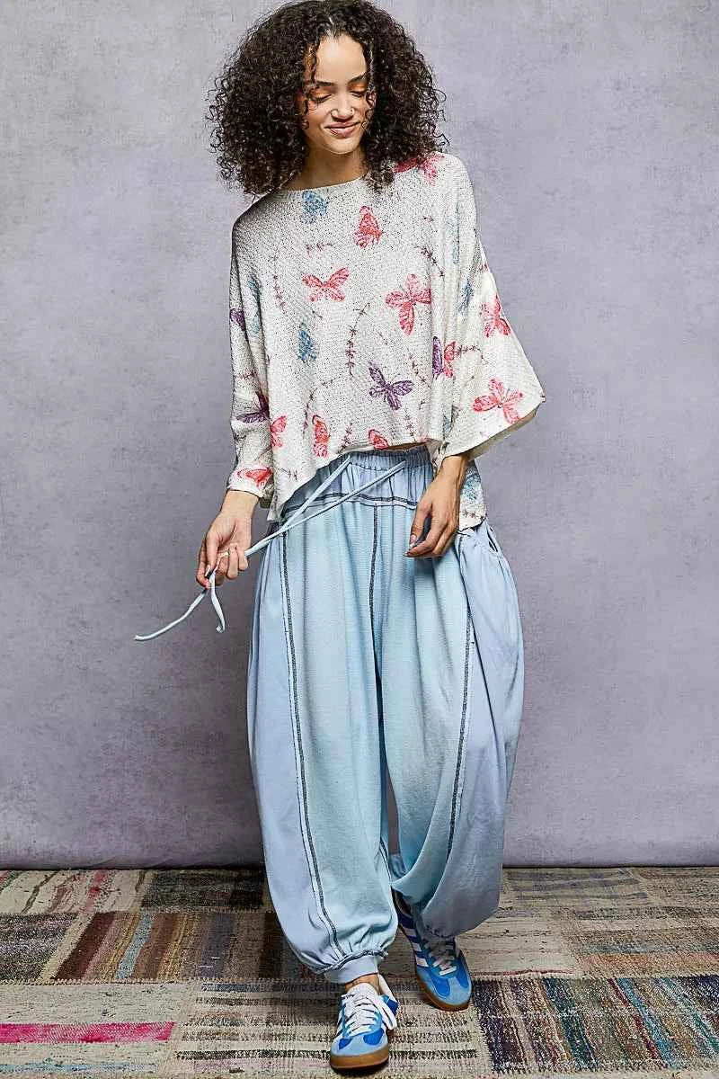 POL Butterflies Pattern Round Neck knit Top with Outseam Rolling Edge POL Butterflies Pattern Round Neck knit Top with Outseam Rolling Edge