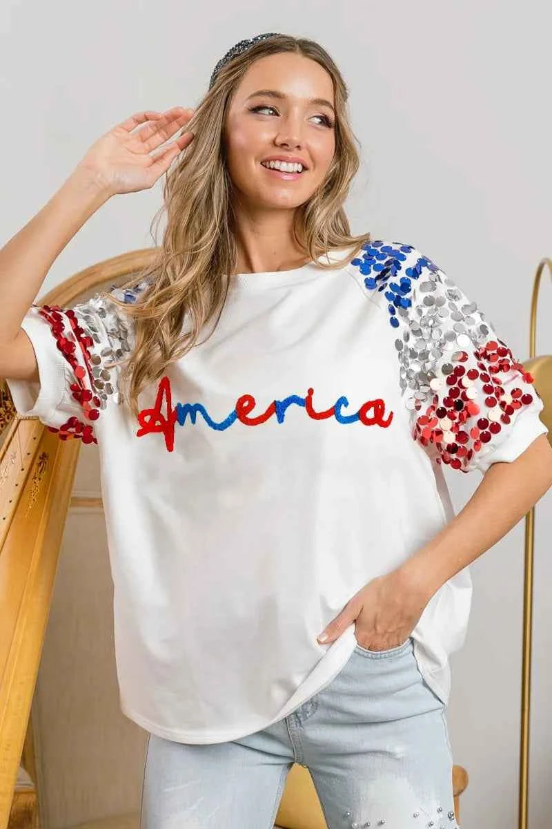 BiBi America Letter Applique Spangle Puff Sleeves Top BiBi America Letter Applique Spangle Puff Sleeves Top