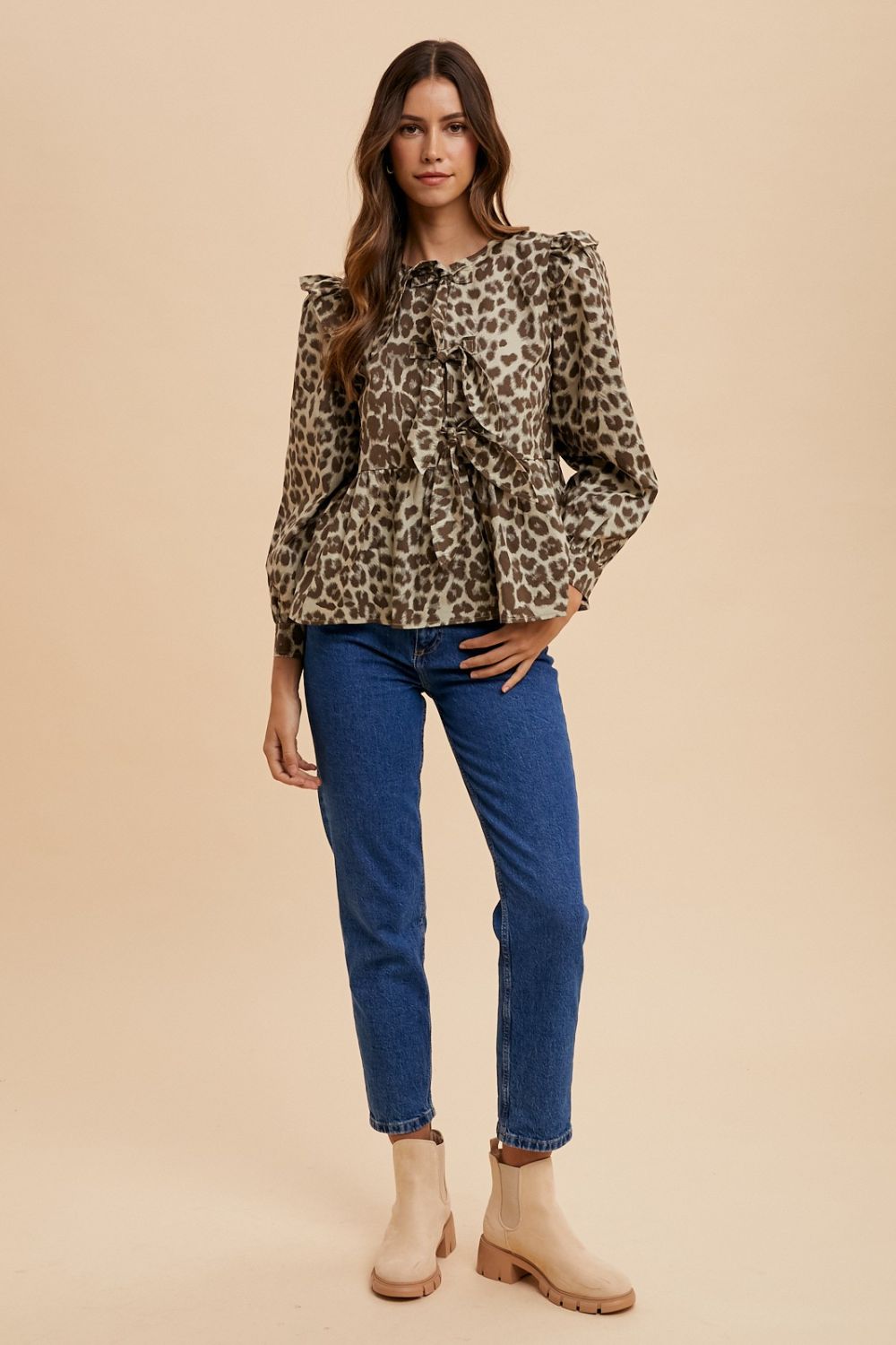 Annie Wear Tied Leopard Round Neck Peplum Blouse Annie Wear Tied Leopard Round Neck Peplum Blouse