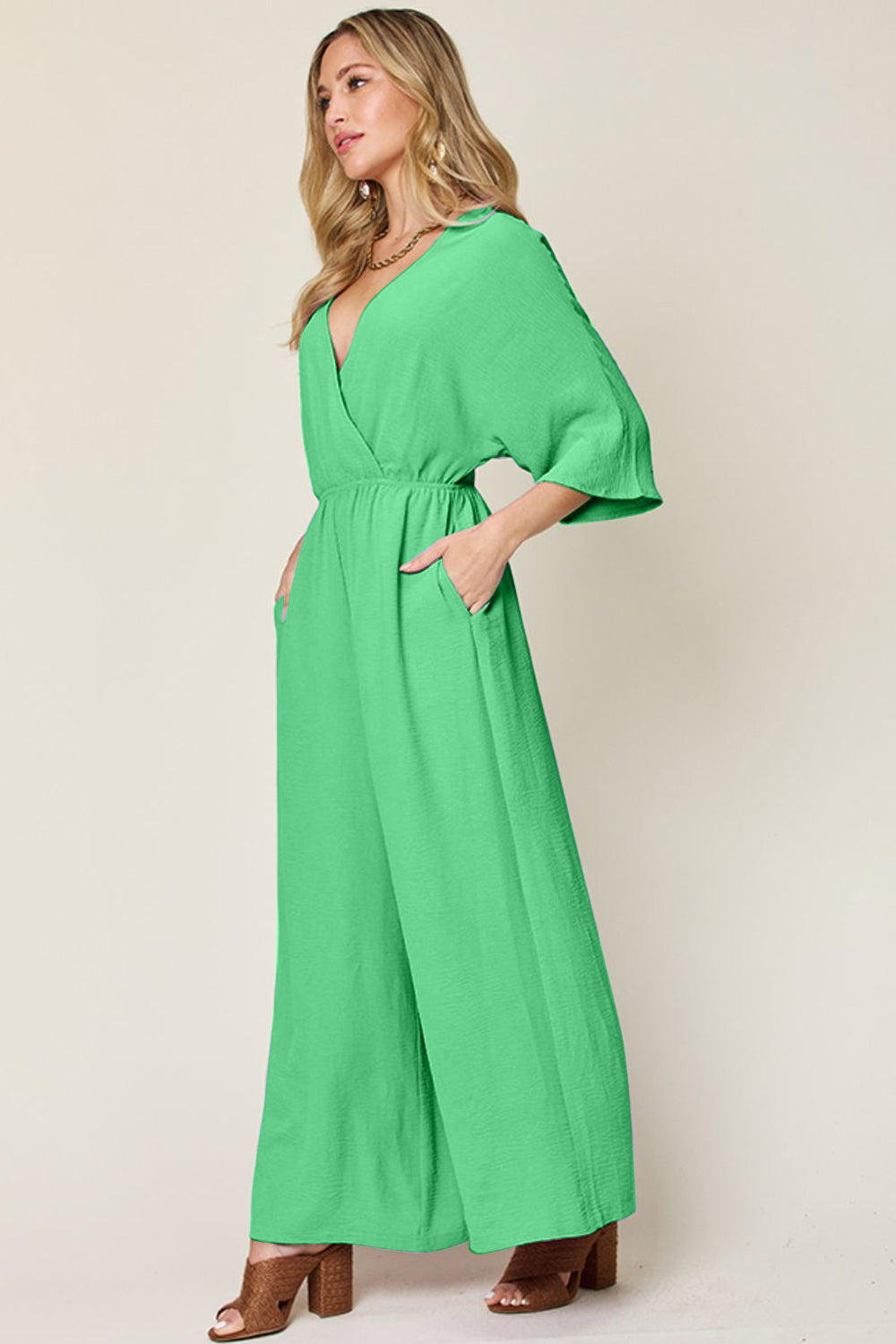 Double Take Full Size Surplice Wide Leg Jumpsuit with Pockets Double Take Full Size Surplice Wide Leg Jumpsuit with Pockets