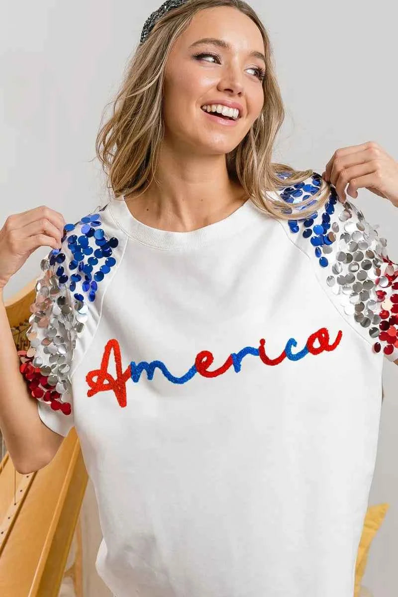 BiBi America Letter Applique Spangle Puff Sleeves Top BiBi America Letter Applique Spangle Puff Sleeves Top