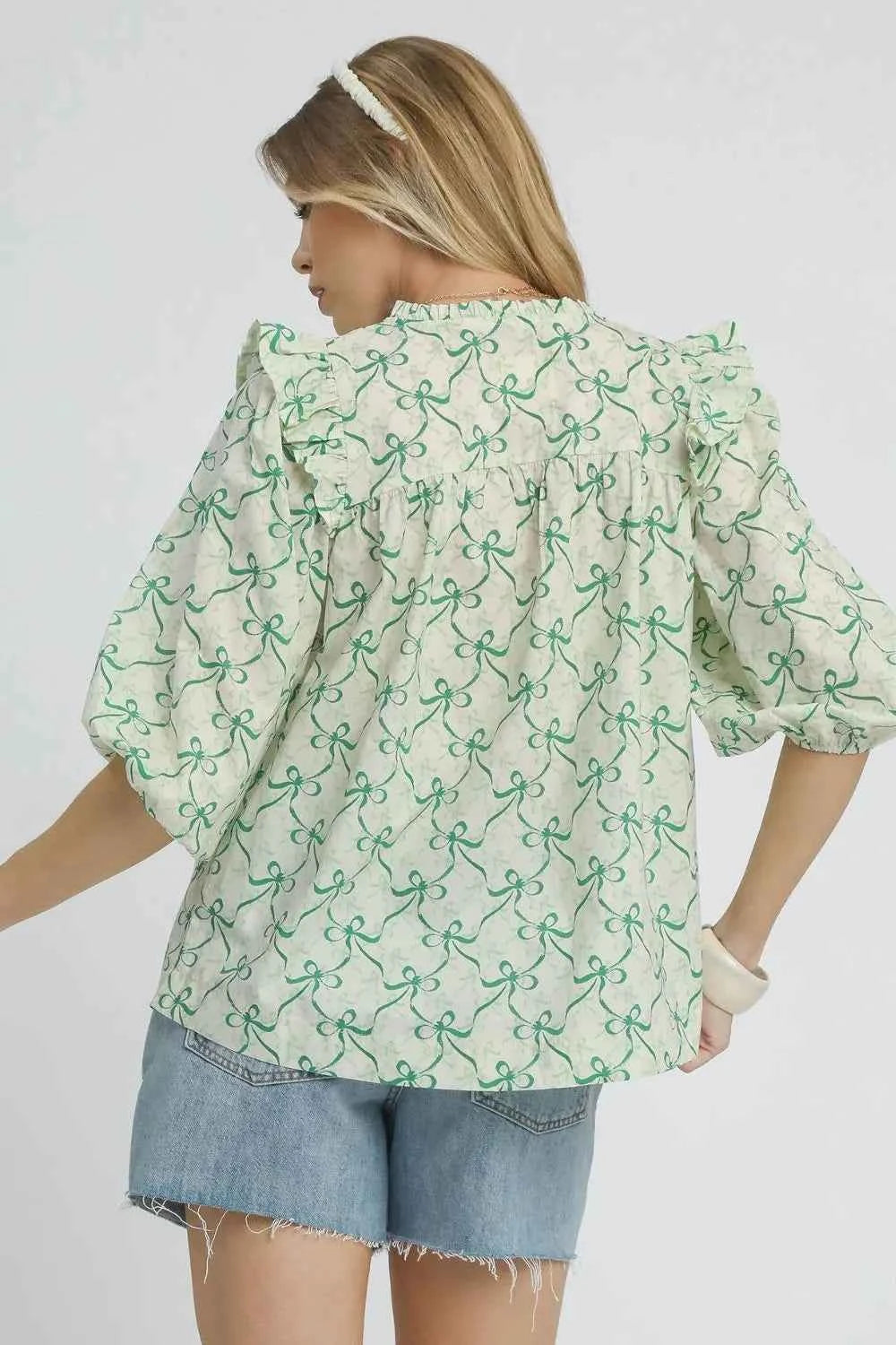 Umgee Ruffled Bow Print Notched Blouse Umgee Ruffled Bow Print Notched Blouse
