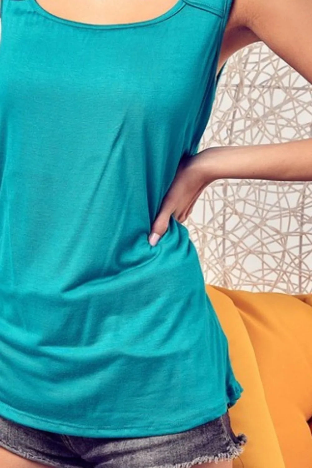 BiBi Rayon Span Knit With Cut Out Front Sleeveless Top 6f4ec02c-7c4d-40aa-a249-4f4abc43f810-Max-Origin