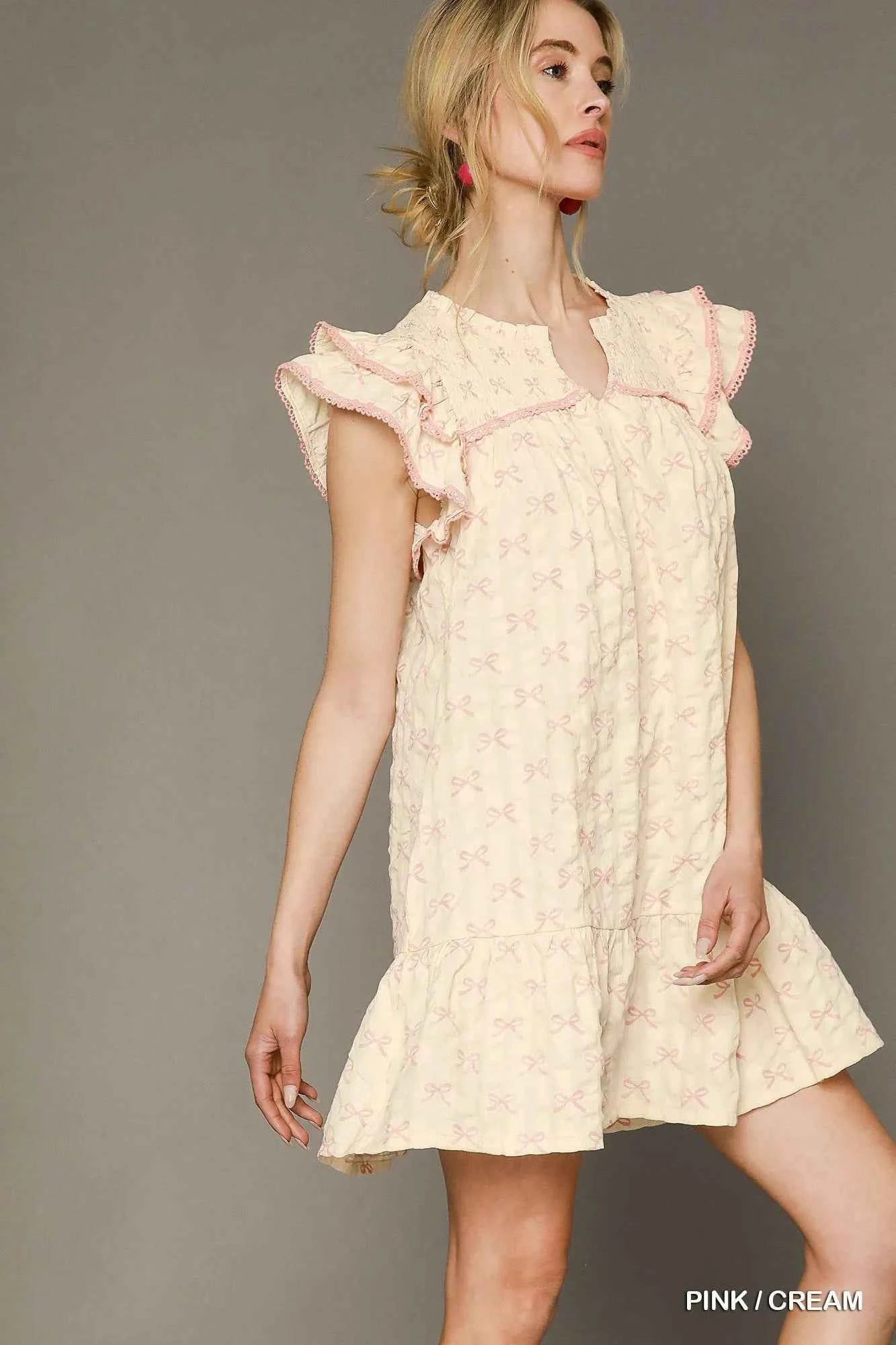 Umgee Bow Print Ruffled Cap Sleeve Mini Dress Umgee Bow Print Ruffled Cap Sleeve Mini Dress