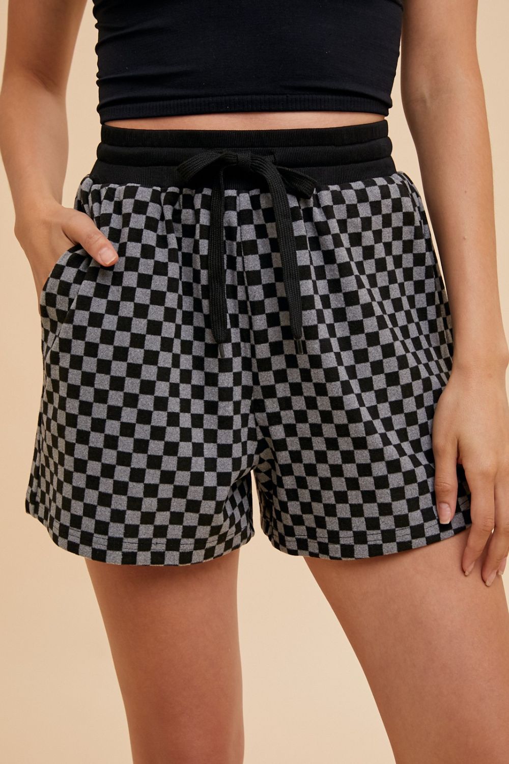 Annie Wear Checkered Round Neck Top and Drawstring Shorts Set Annie Wear Checkered Round Neck Top and Drawstring Shorts Set