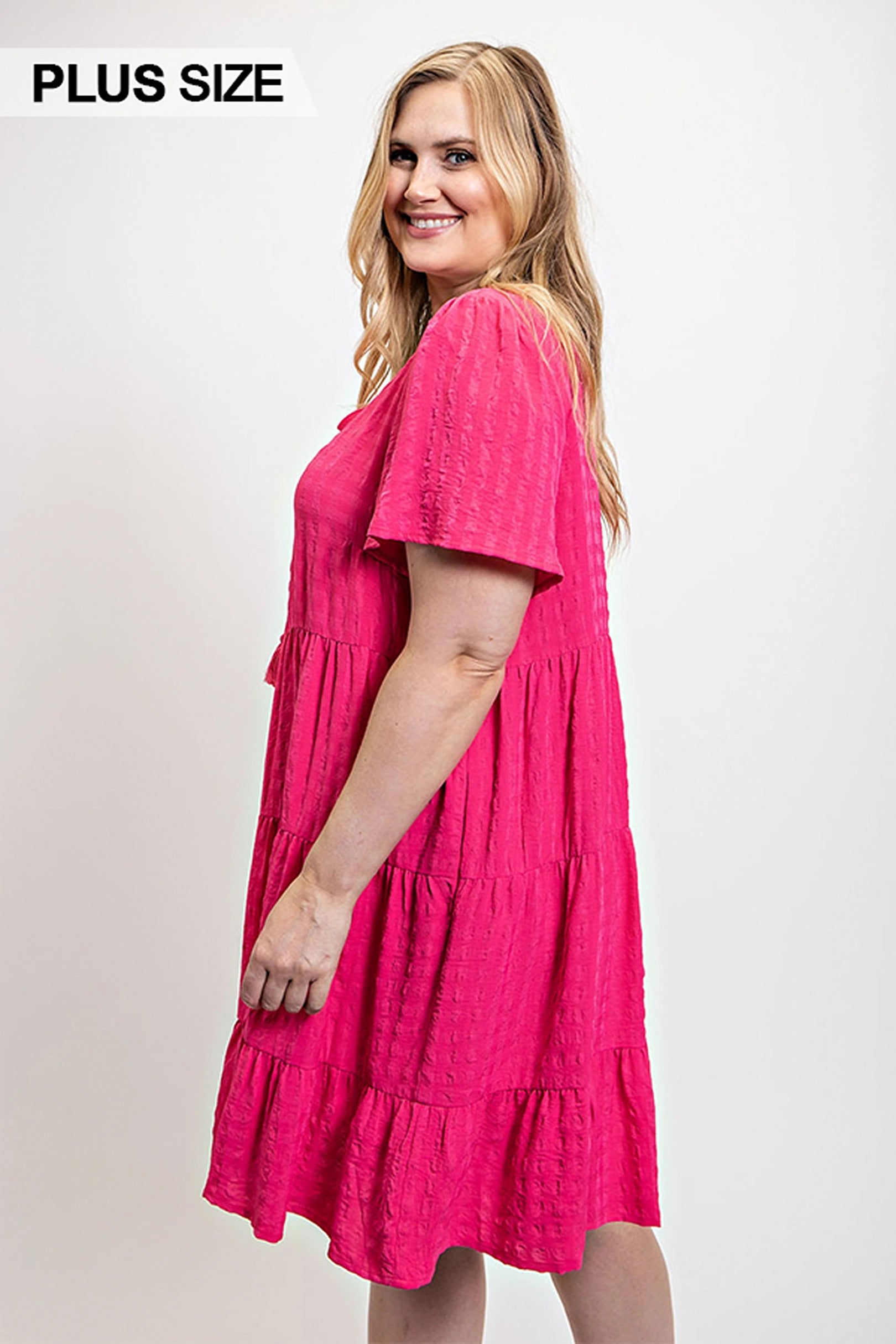 Textured woven tiered dress with tassel tie and pockets product image