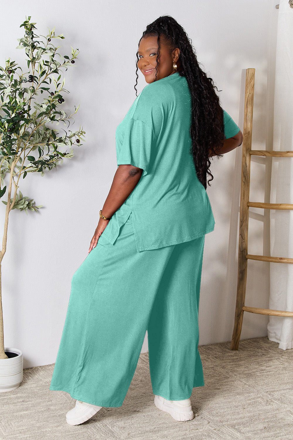 Double Take Full Size Round Neck Slit Top and Pants Set Double Take Full Size Round Neck Slit Top and Pants Set - TopFashionHQ