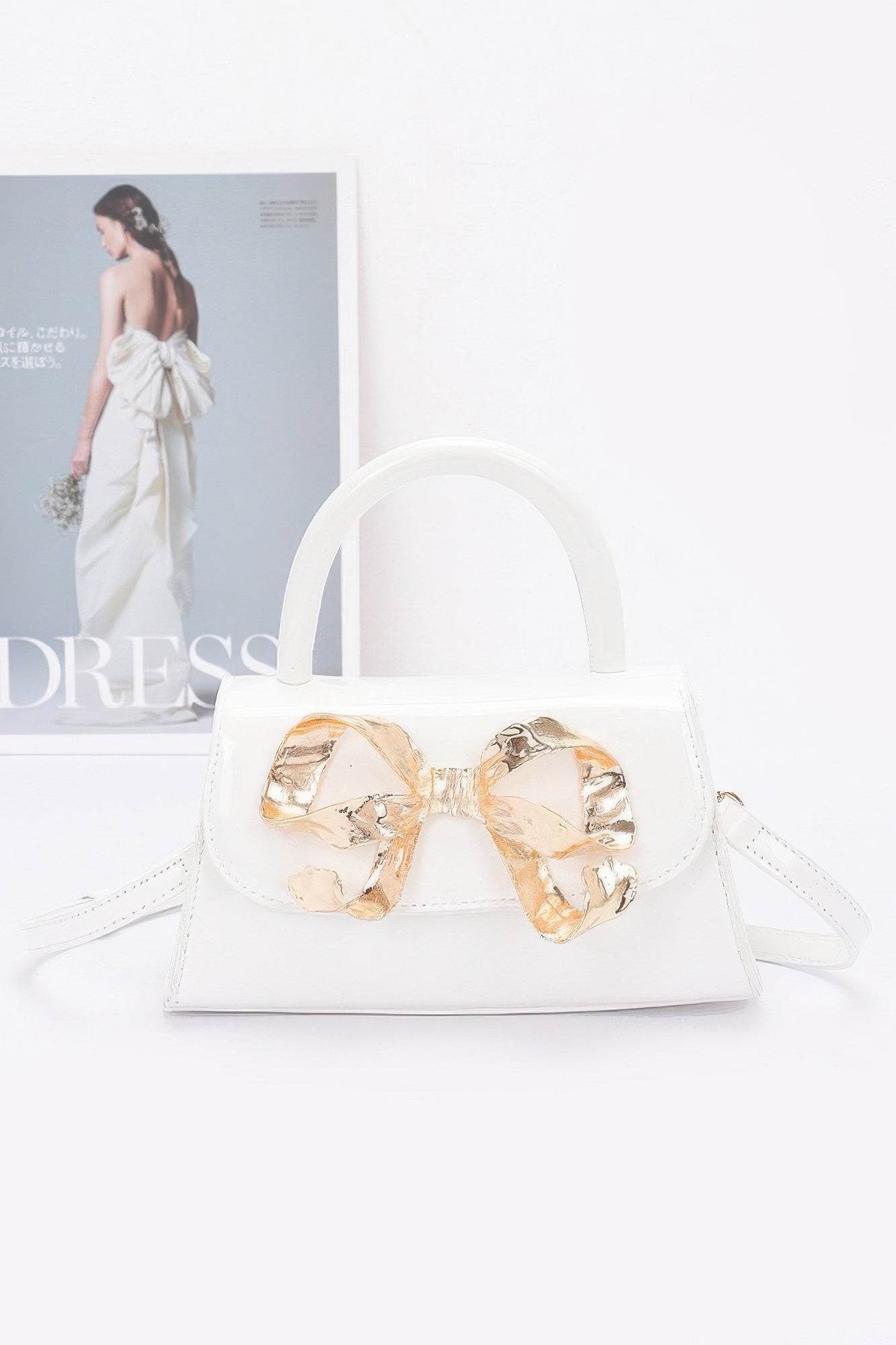 Faux Leather Metal Ribbon Top Handle Bag product image