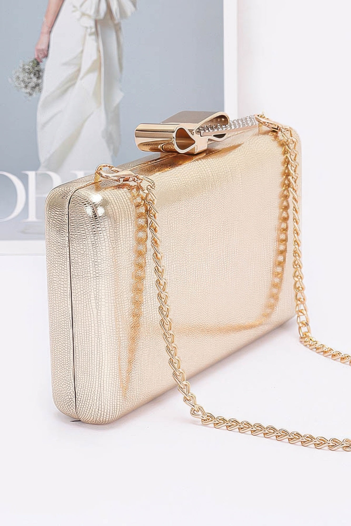 Metal Ribbon Top Case Clutch product image