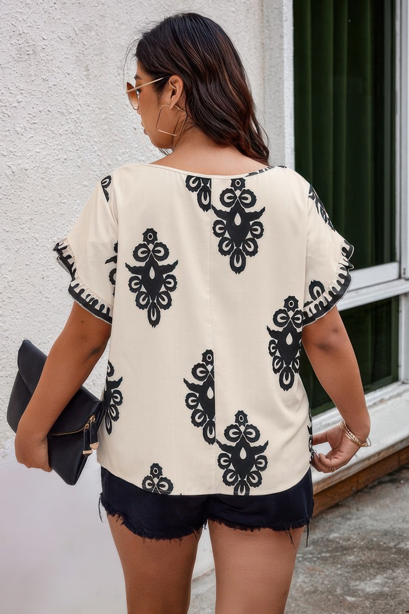 Plus Printed Ruffle Hem Wide Round Neck Blouse product image