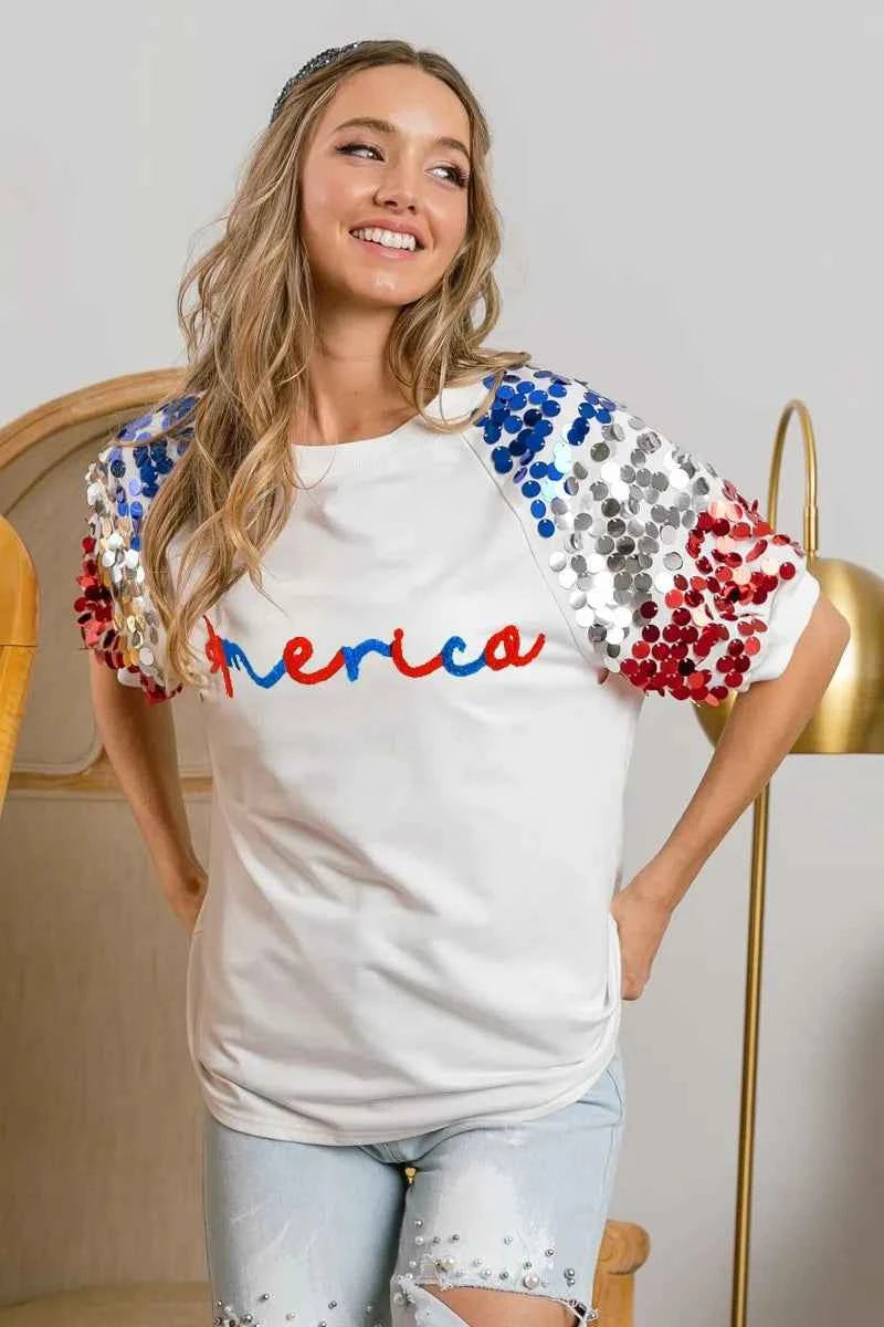 BiBi America Letter Applique Spangle Puff Sleeves Top BiBi America Letter Applique Spangle Puff Sleeves Top