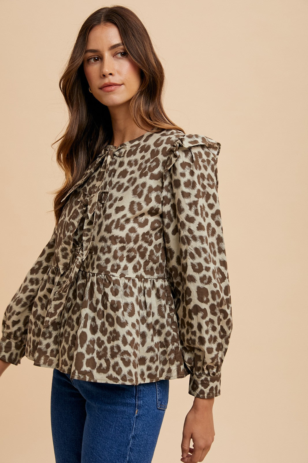 Annie Wear Tied Leopard Round Neck Peplum Blouse Annie Wear Tied Leopard Round Neck Peplum Blouse