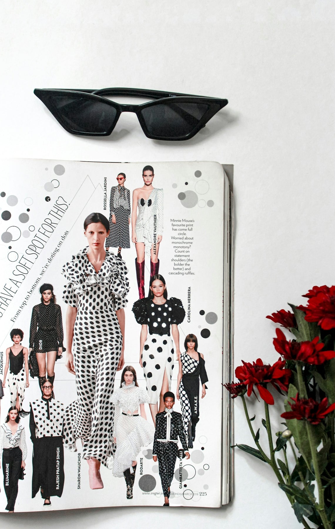 woman in black and white polka dot dress