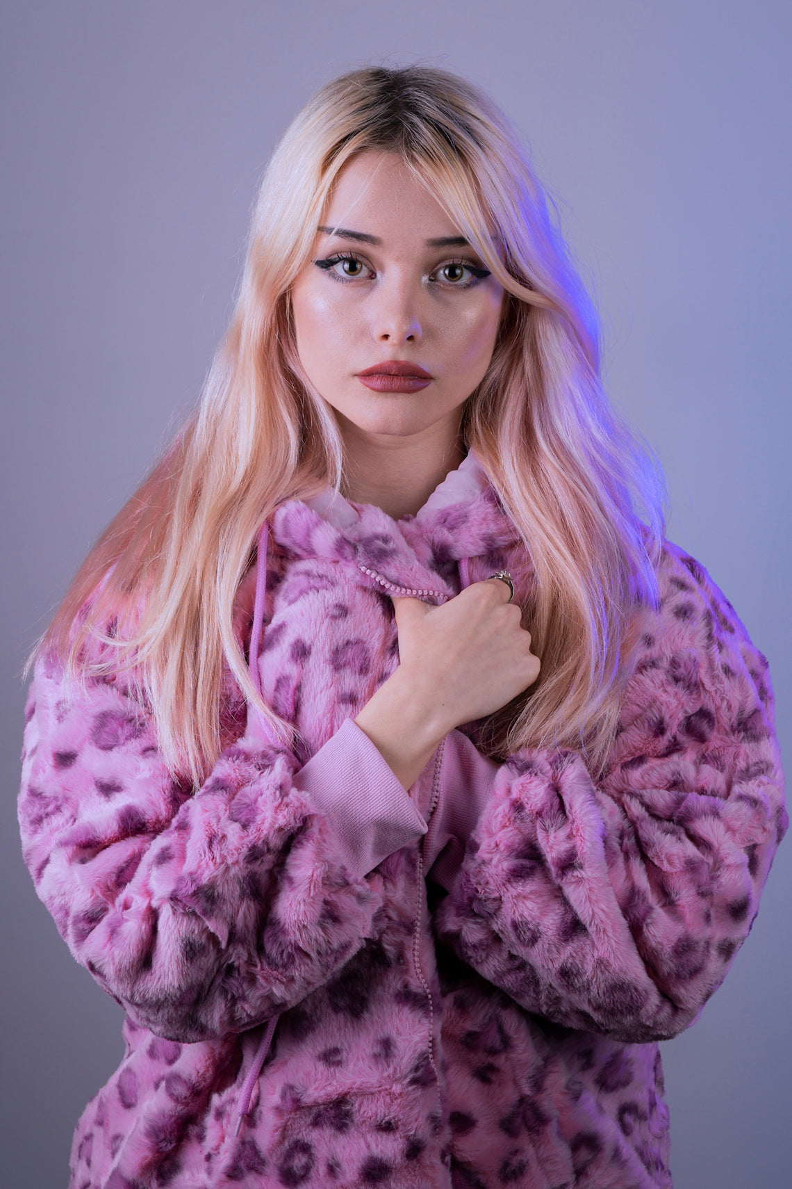 woman in purple and white floral robe