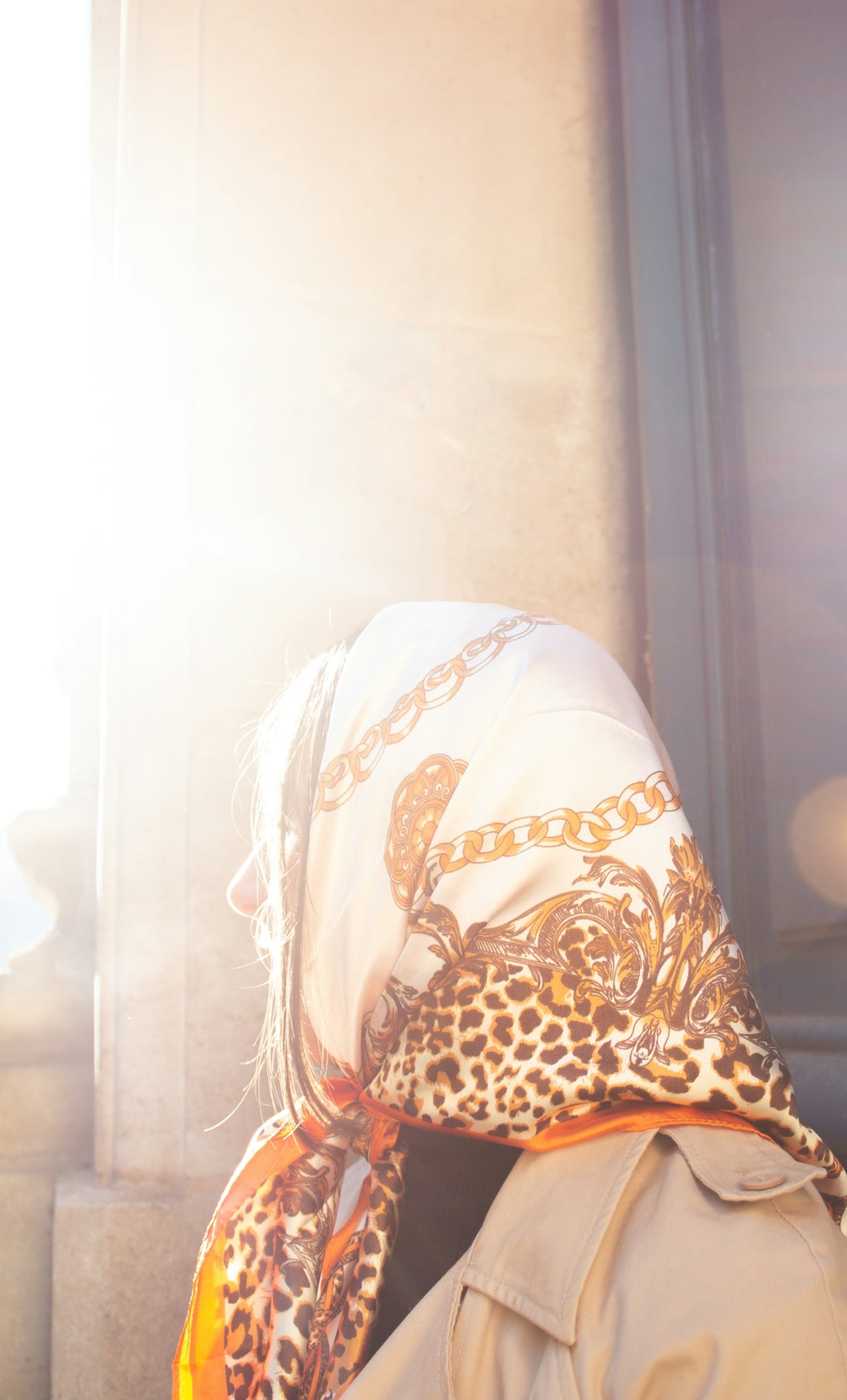 a person with a scarf on their head