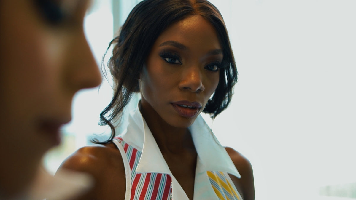 a woman with a tie around her neck