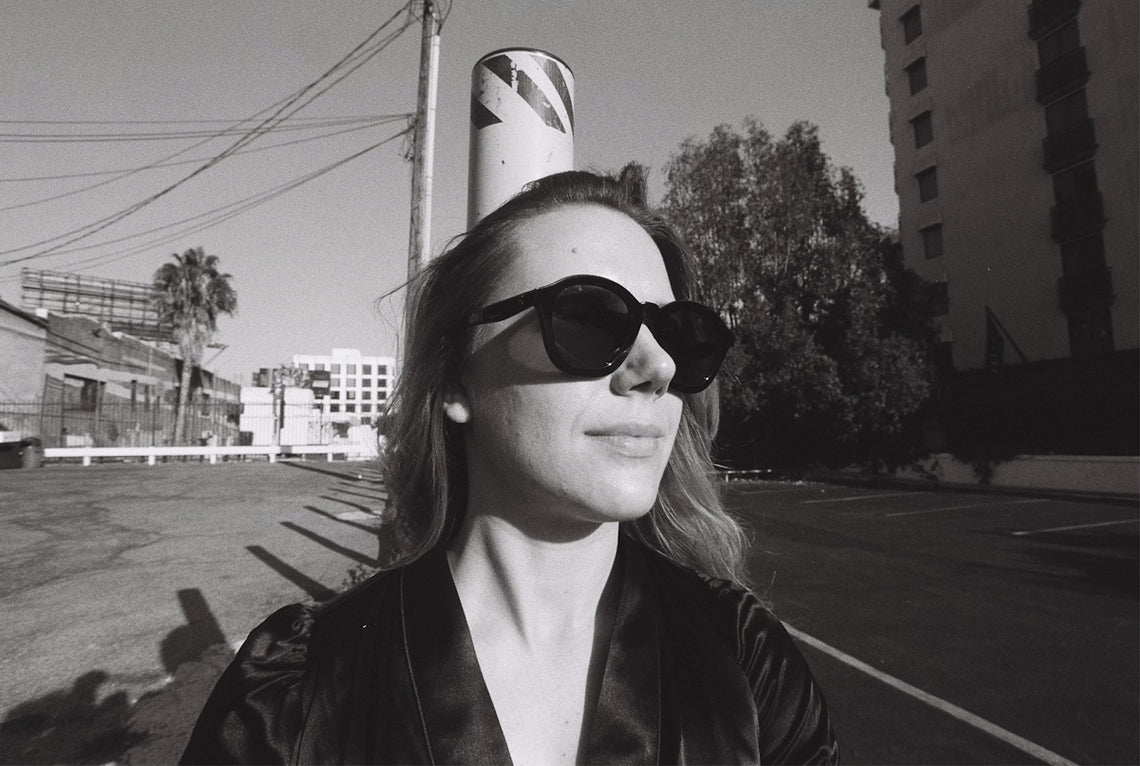 Woman wearing sunglasses on a sunny day