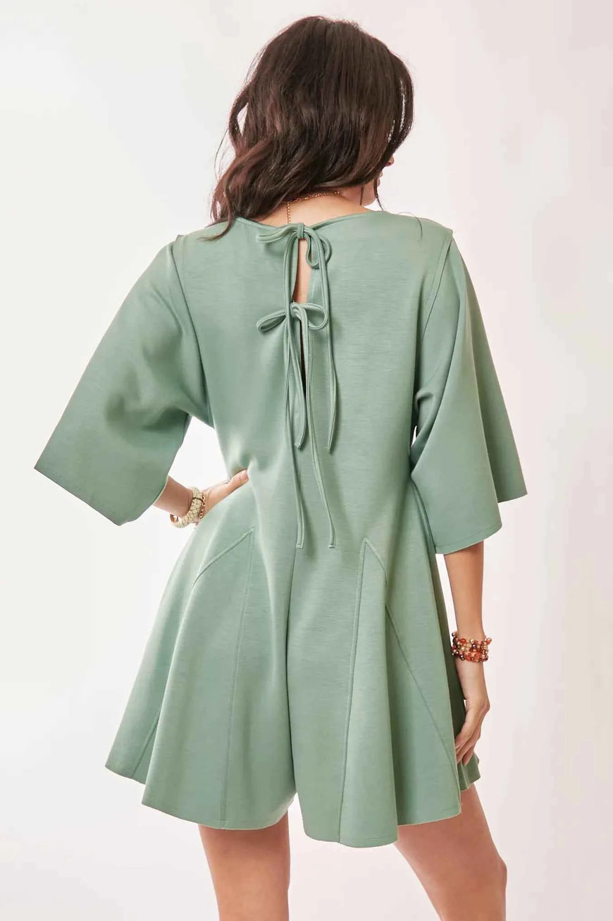 Davi & Dani Solid Draped Sleeve Ties Back Skort Romper
